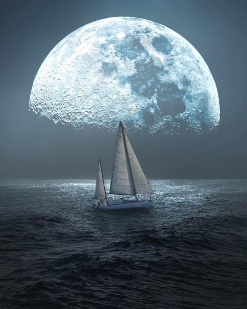 velero-navegando-en-el-mar-con-una-gran-luna-de-fondo.jpg